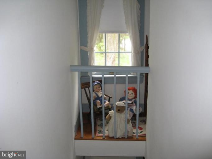 11811 Ridgemont Road Lutherville-Timonium, MD 21093 - Photo 5 of 17 a view of a livingroom with wooden floor and a window