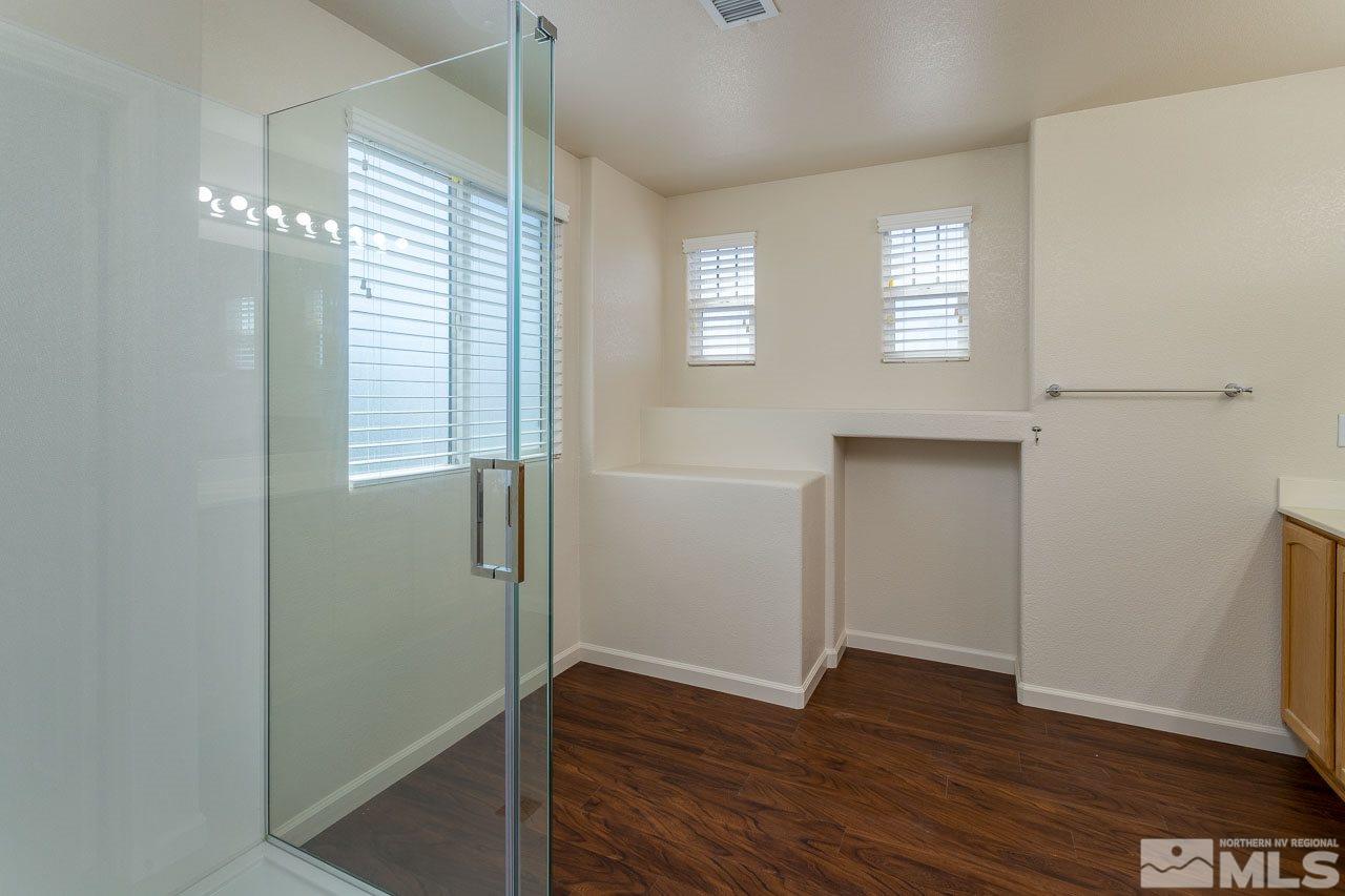 981 South University Reno, NV 89512 - Photo 15 of 19 a view of empty room with wooden floor and fan