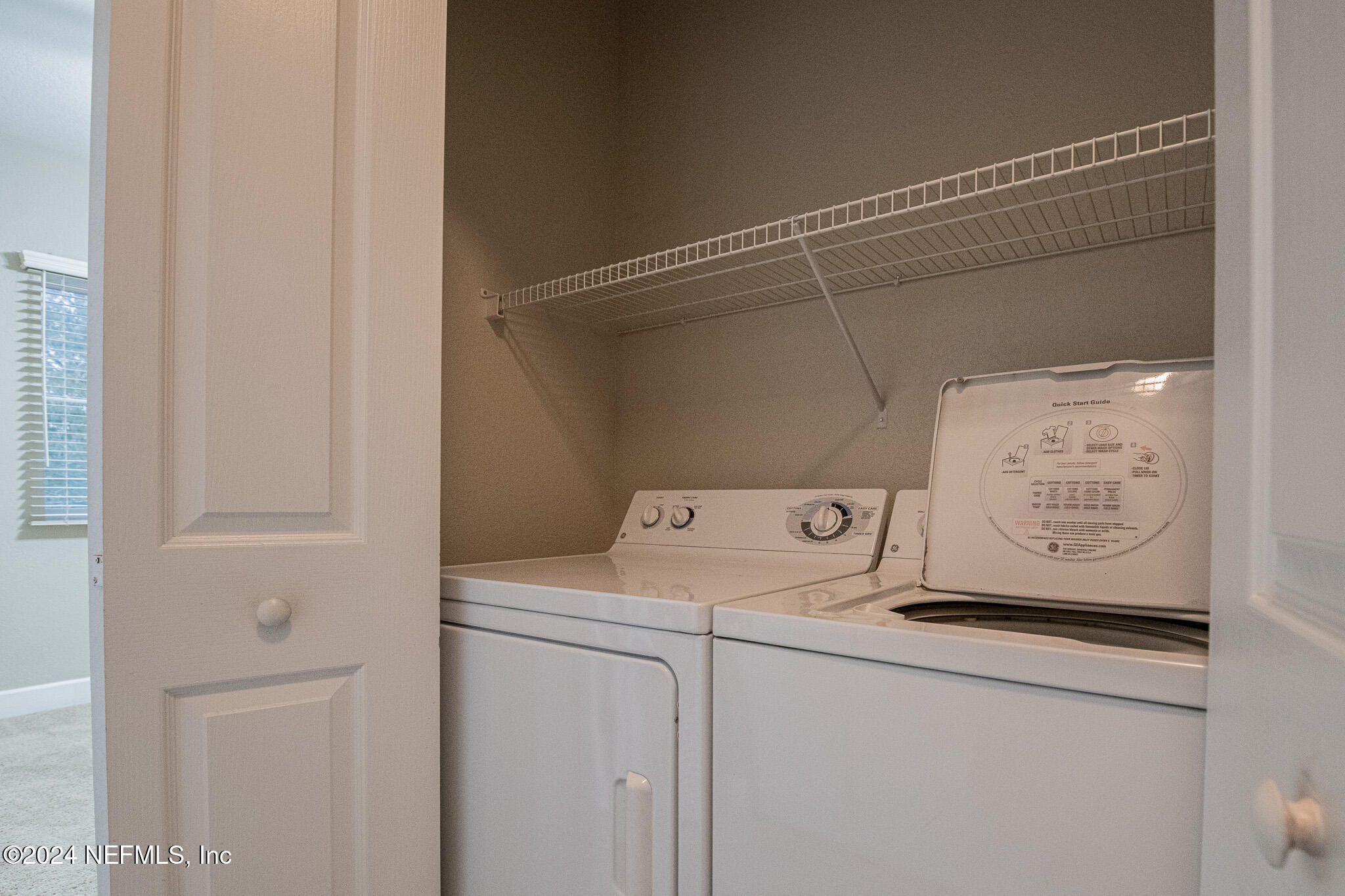 9745 Touchton Road, Unit 1922 Jacksonville, FL 32246 - Photo 21 of 26 a utility room with dryer and washer