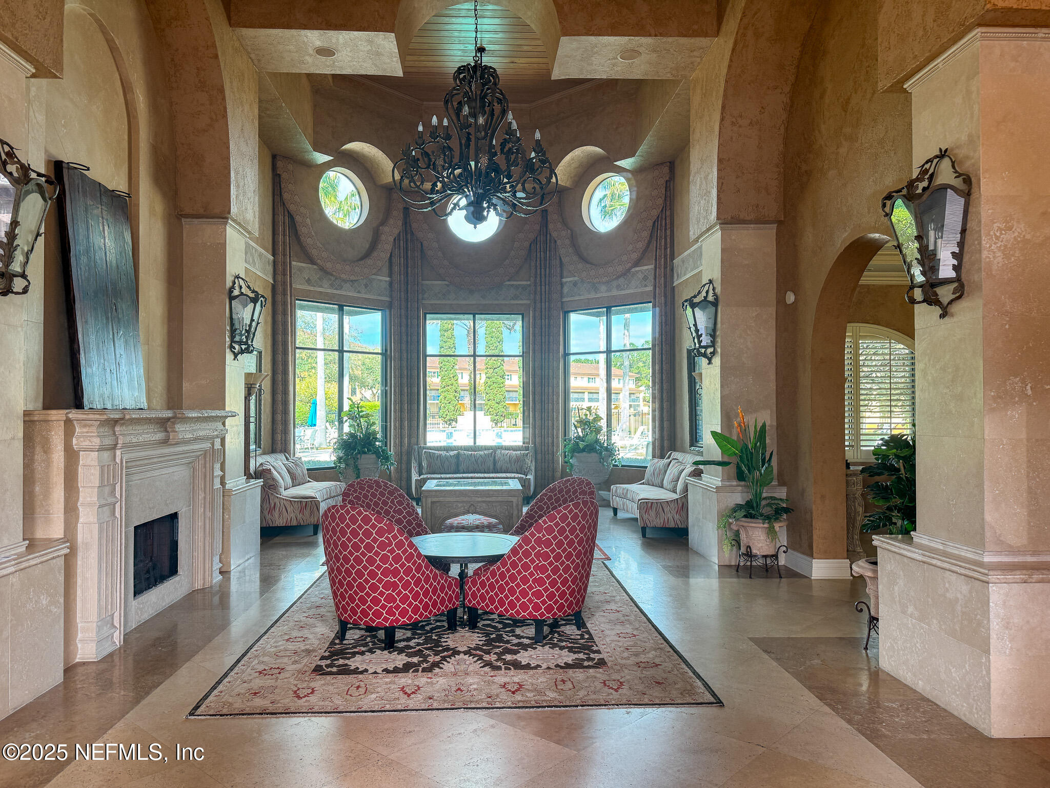 9745 Touchton Road, Unit 1922 Jacksonville, FL 32246 - Photo 23 of 26 a view of a dining room with furniture a fireplace and wooden floor