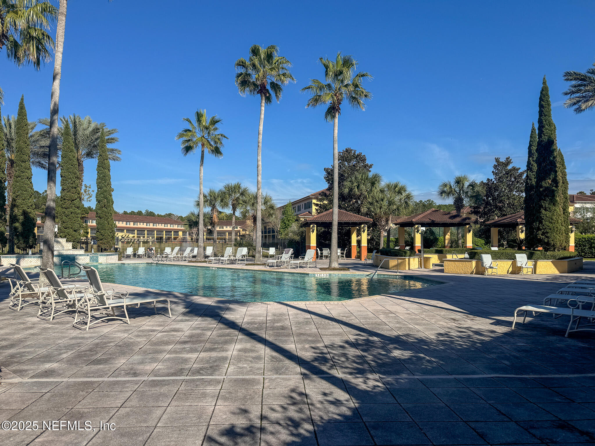 9745 Touchton Road, Unit 1922 Jacksonville, FL 32246 - Photo 25 of 26 a view of a house with a swimming pool