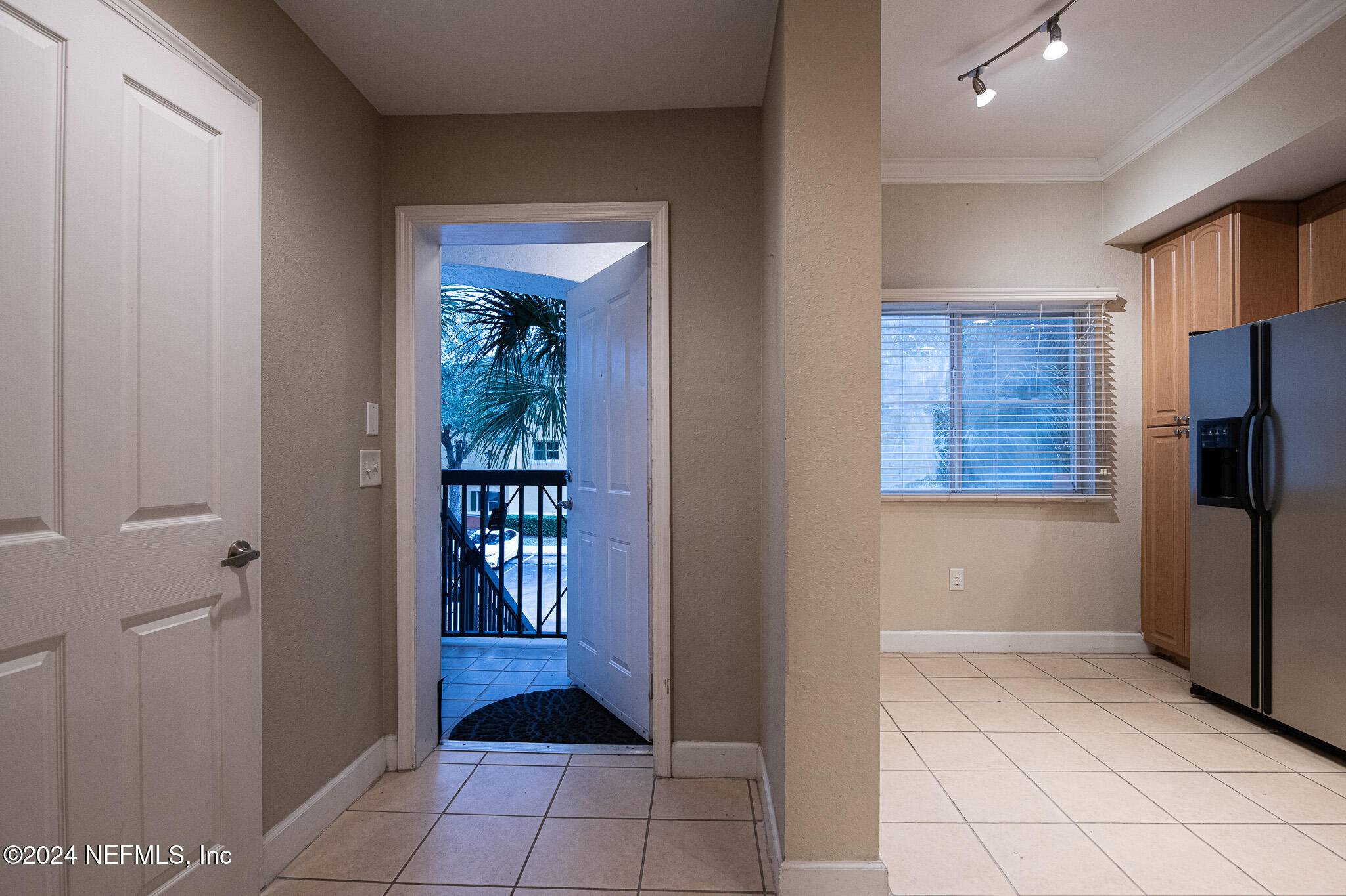 9745 Touchton Road, Unit 1922 Jacksonville, FL 32246 - Photo 9 of 26 a view of a hallway and a livingroom with entryway
