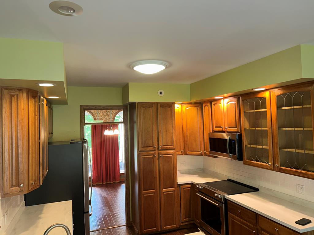 114 Oak Ridge Drive Clarion, PA 16214 - Photo 7 of 38 a kitchen with stainless steel appliances granite countertop a refrigerator and a stove