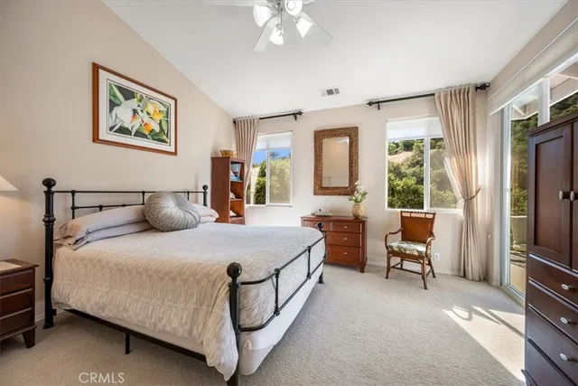 a outdoor space with patio the couches and a umbrella