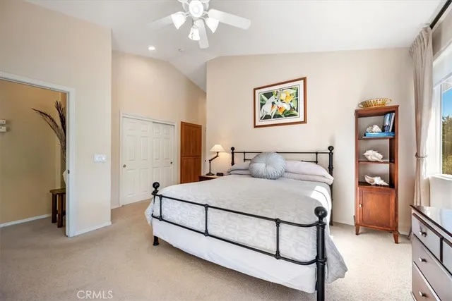 a view of balcony with furniture and umbrella