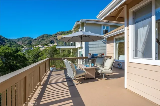 a view of a livingroom with furniture and toys