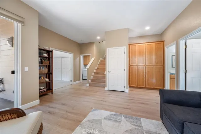 a view of a chairs and table in the balcony