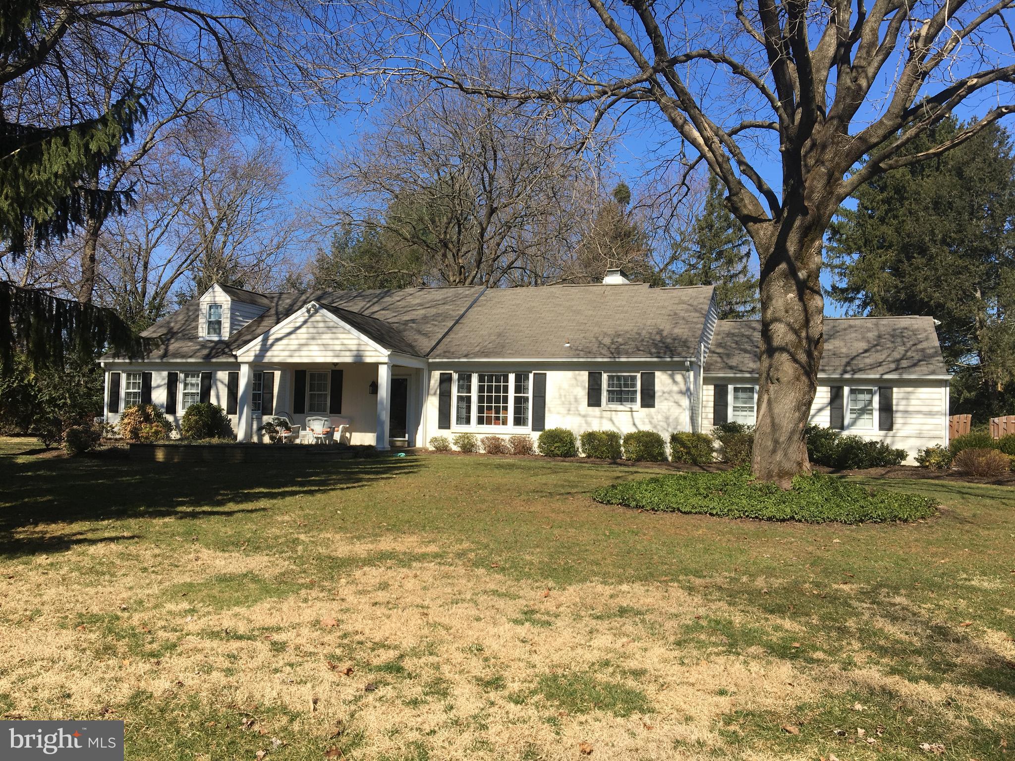 591 General Scott Road Wayne, PA 19087 - Photo 1 of 6 a front view of a house with garden