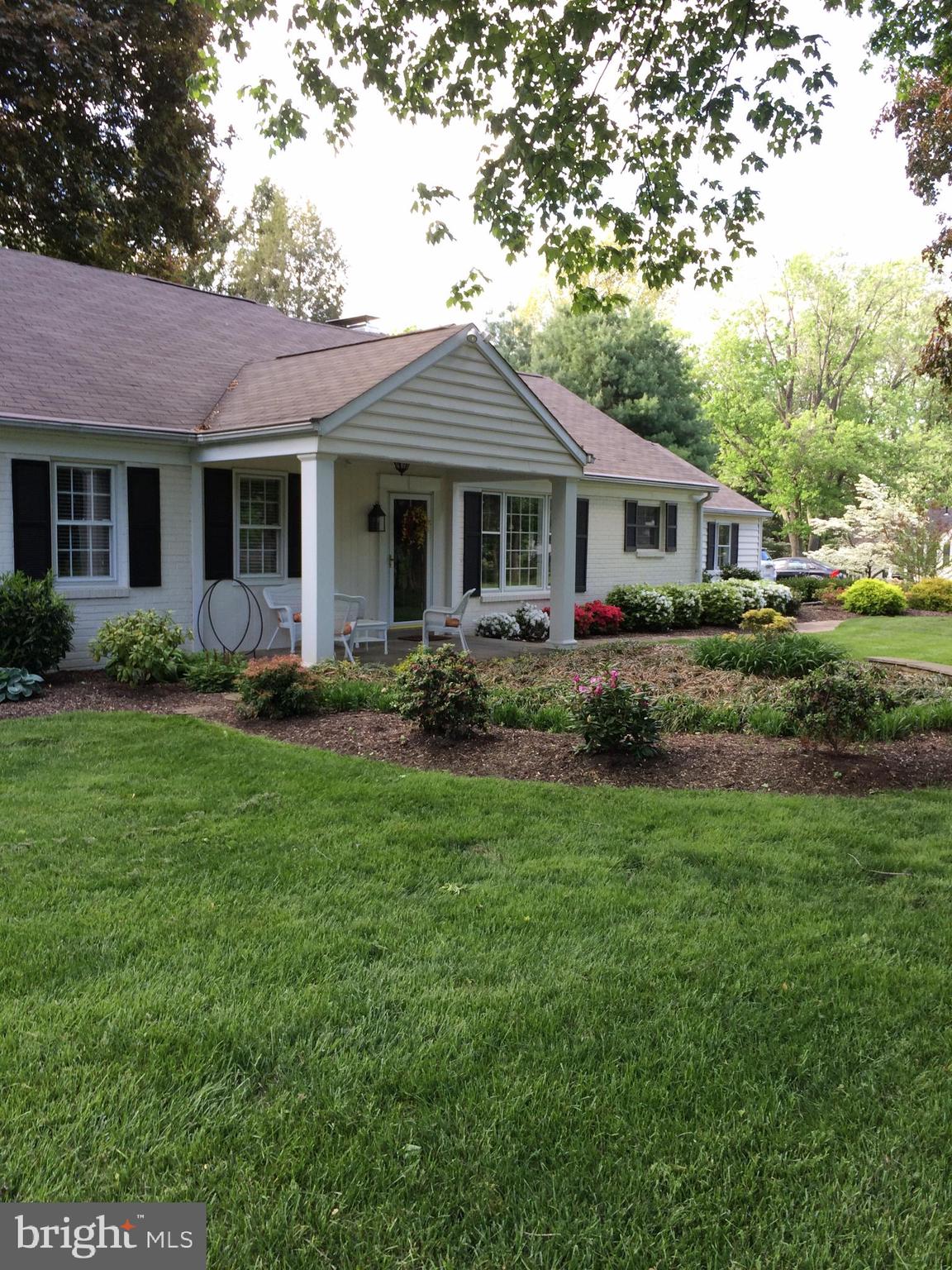 591 General Scott Road Wayne, PA 19087 - Photo 4 of 6 a front view of a house with garden