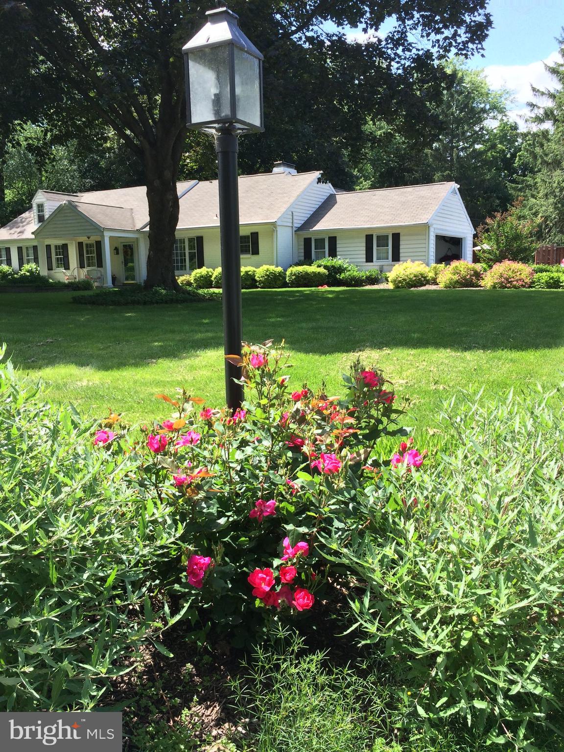 591 General Scott Road Wayne, PA 19087 - Photo 6 of 6 a view of a house with a yard and garden