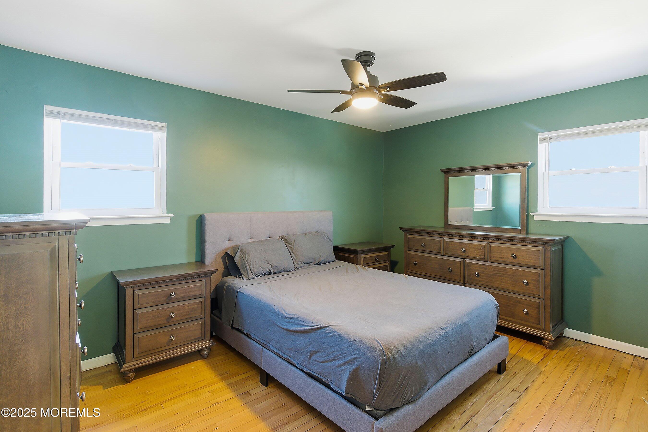 2178 Lanes Mill Road Brick, NJ 08724 - Photo 17 of 34 a bedroom with a bed and a dresser