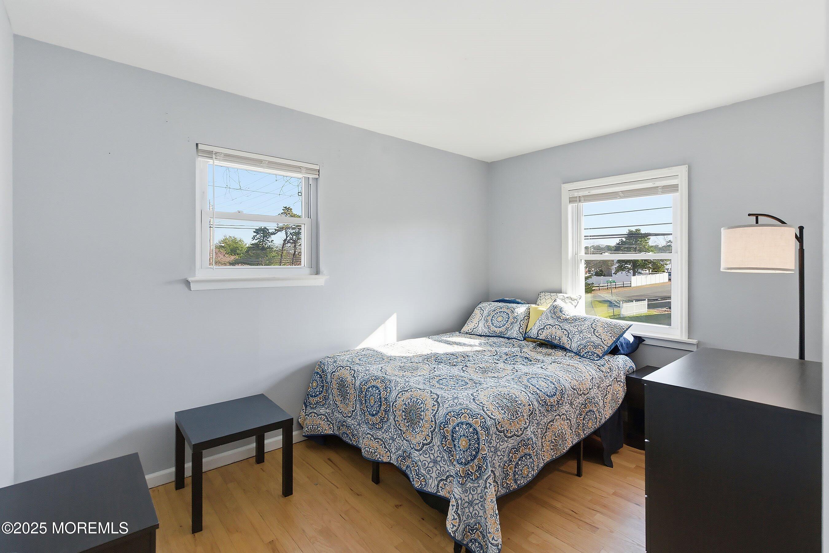 2178 Lanes Mill Road Brick, NJ 08724 - Photo 19 of 34 a bedroom that has a bed and a window in it