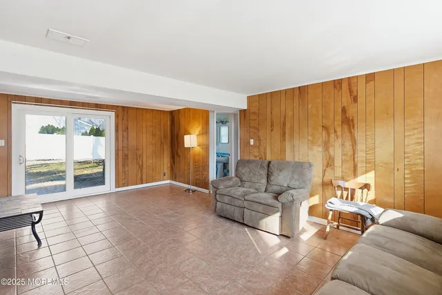 an aerial view of residential houses with city view