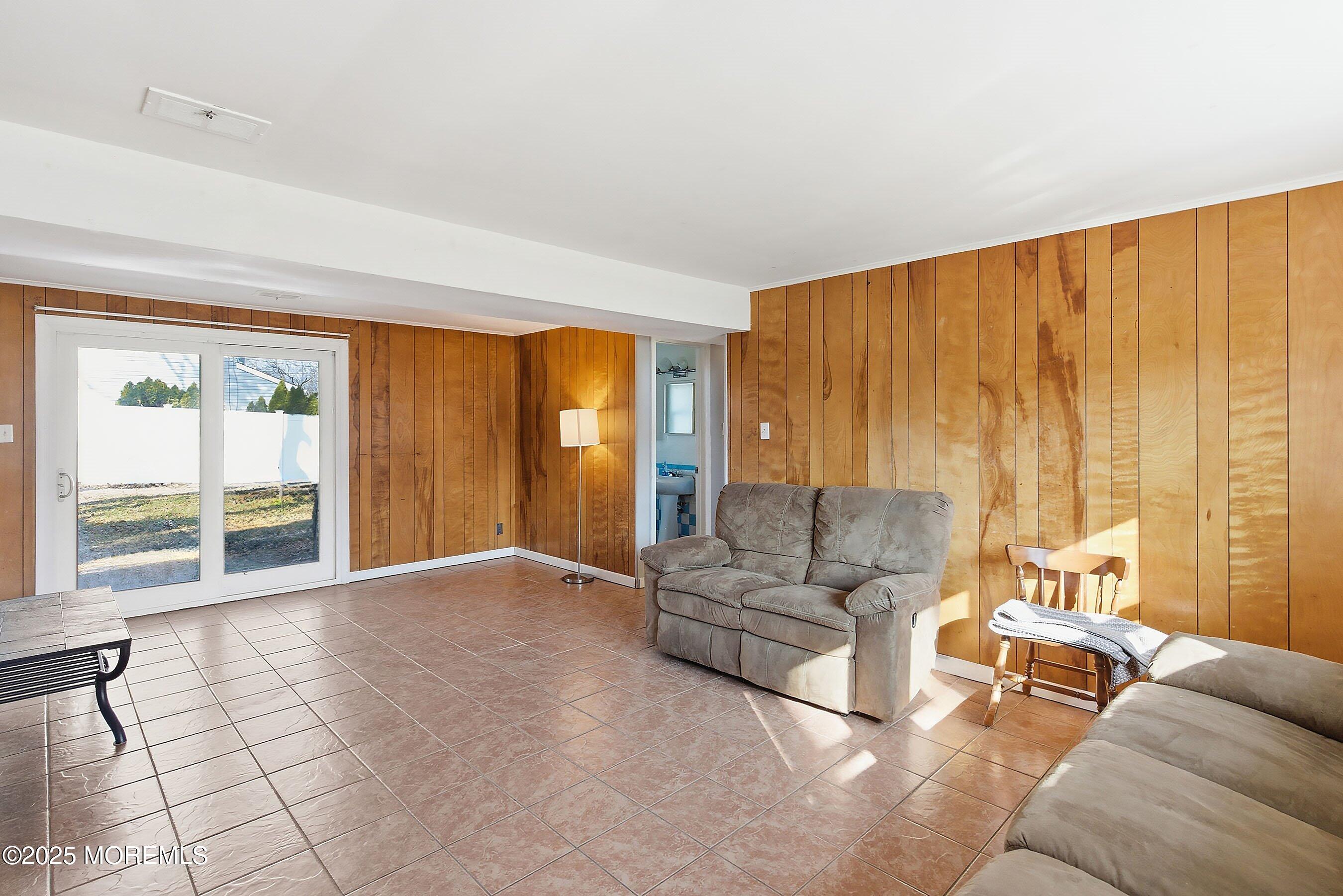 2178 Lanes Mill Road Brick, NJ 08724 - Photo 21 of 34 a living room with furniture and a large window