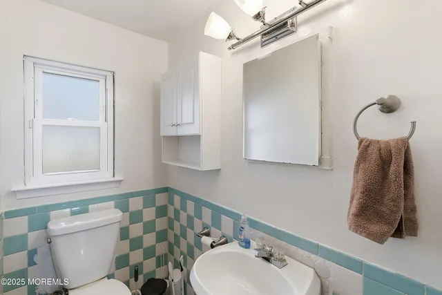 an aerial view of residential building and parking space