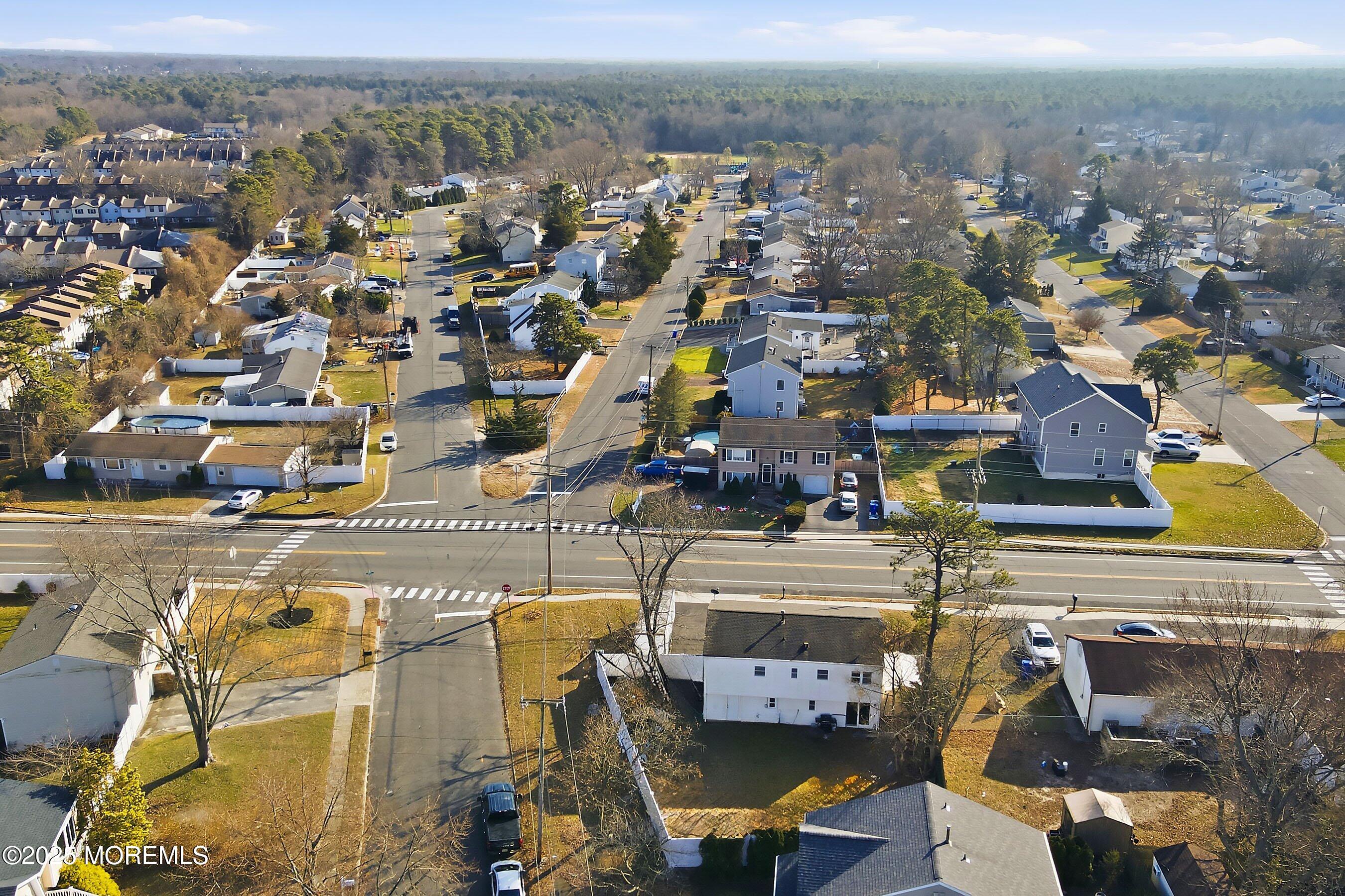 2178 Lanes Mill Road Brick, NJ 08724 - Photo 29 of 34 an aerial view of residential houses with outdoor space