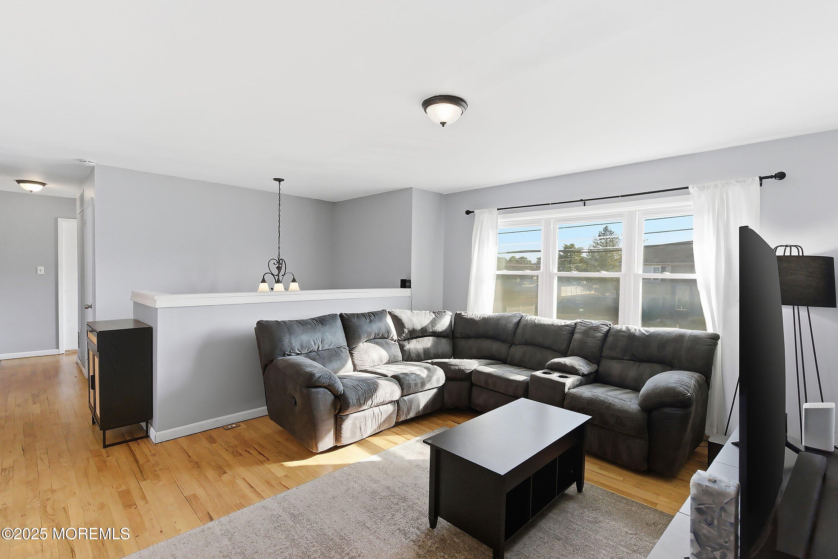 2178 Lanes Mill Road Brick, NJ 08724 - Photo 8 of 34 a living room with furniture and a window