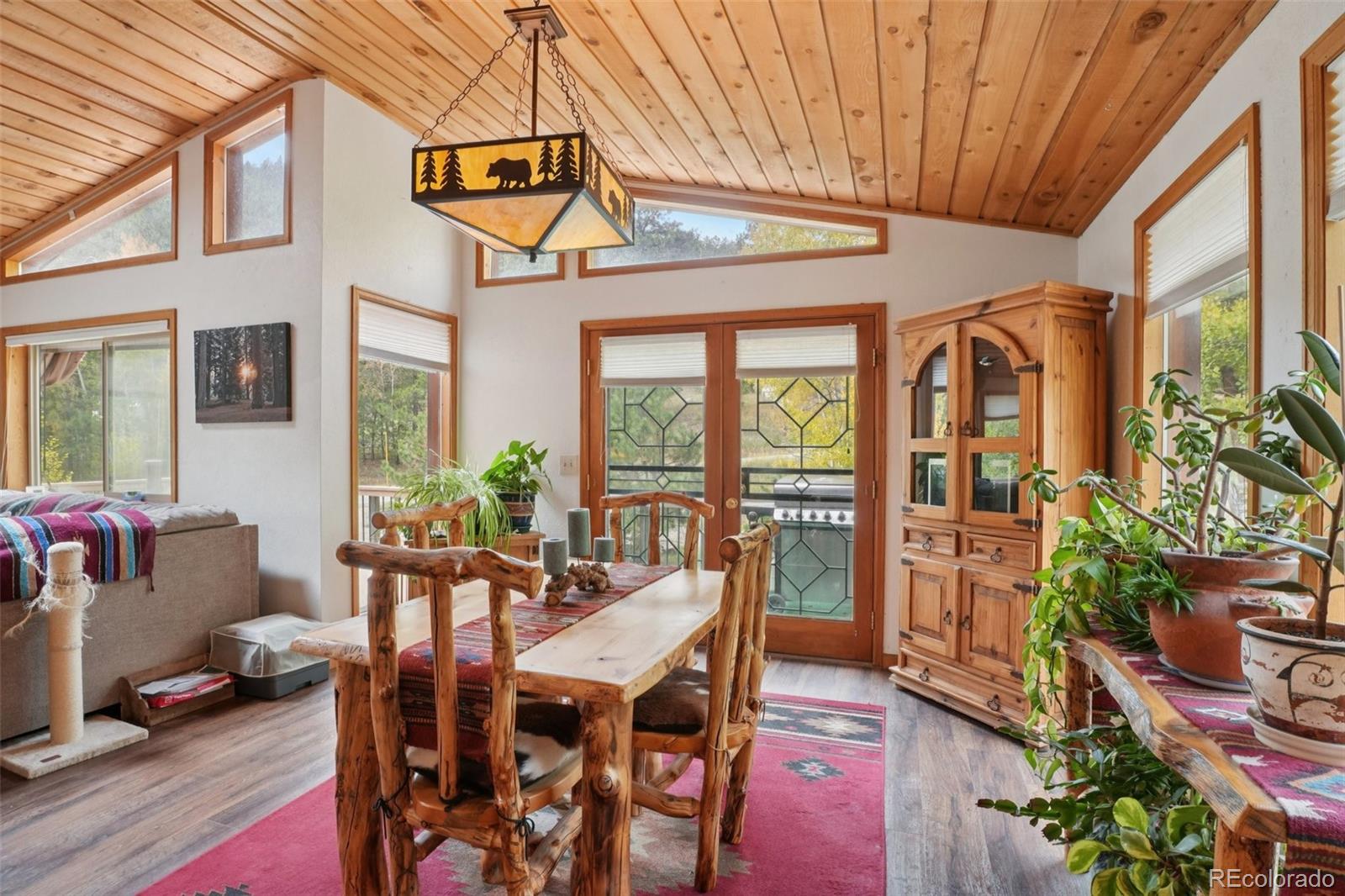 42 Catamount Ridge Road Bailey, CO 80421 - Photo 7 of 36 a view of a patio with furniture