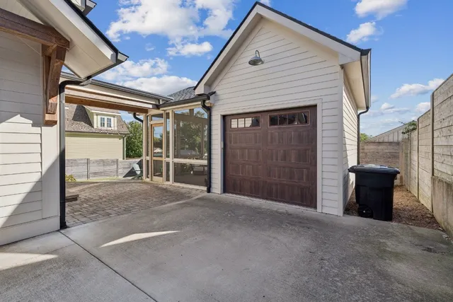 a view of a house with a flat screen tv