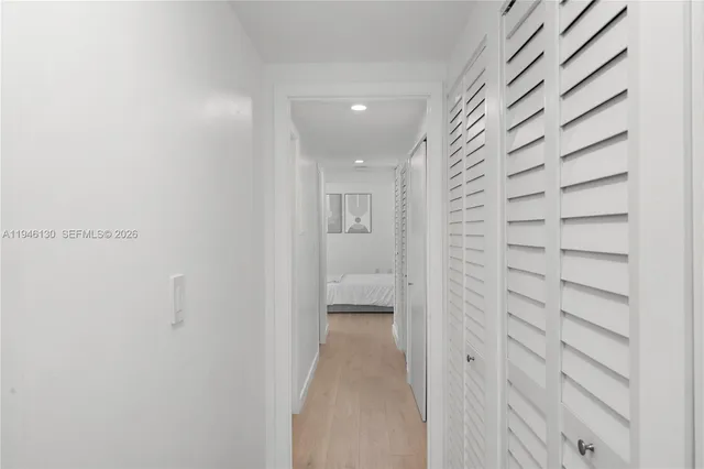 a view of entryway with bathroom