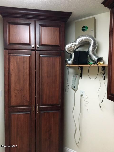 3000 Turtle Mound Road Melbourne, FL 32934 - Photo 50 of 56 Laundry Cabinetry