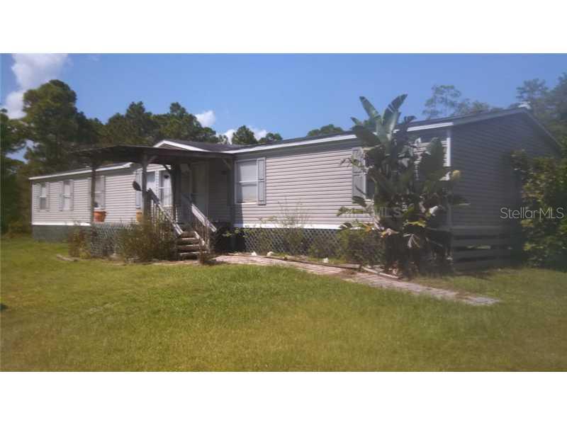 1220 Flatwoods Road Mims, FL 32754 - Photo 1 of 1 Exterior Front