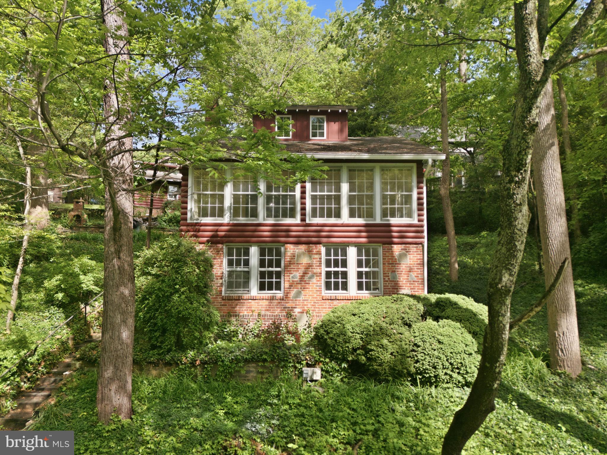 Charming home nestled in lush greenery.