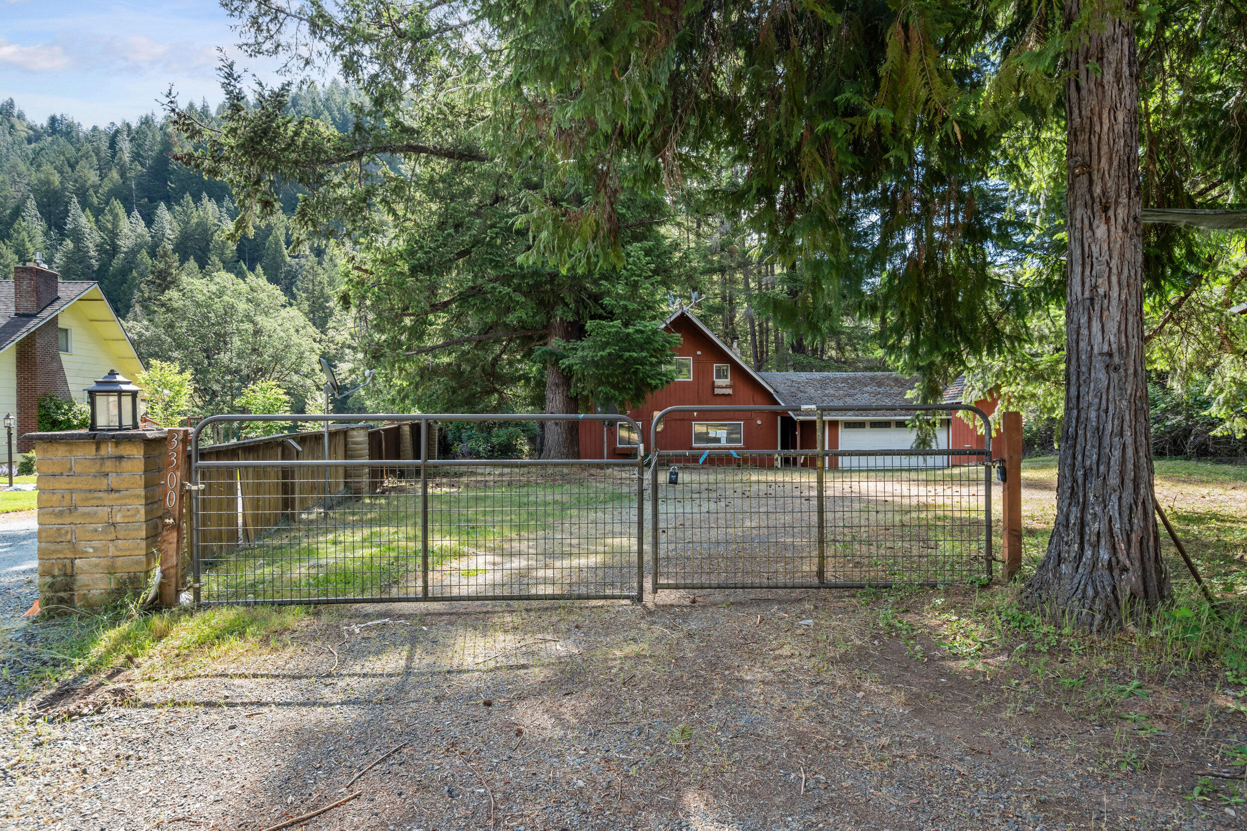 3300 West Evans Creek Road Rogue River, OR 97537 - Photo 1 of 21 a view of backyard and tree