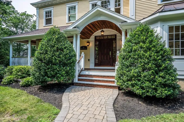 a front view of a house with a porch