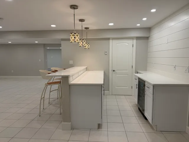 an empty room with a fireplace