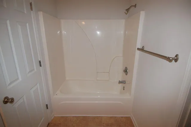 a bathroom with a bathtub