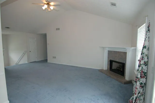 a view of a livingroom with a fireplace
