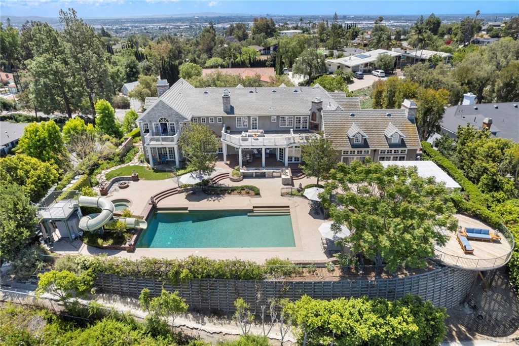 2061 Skyline Drive Fullerton, CA 92831 - Photo 4 of 4 an aerial view of a house with a garden and lake view