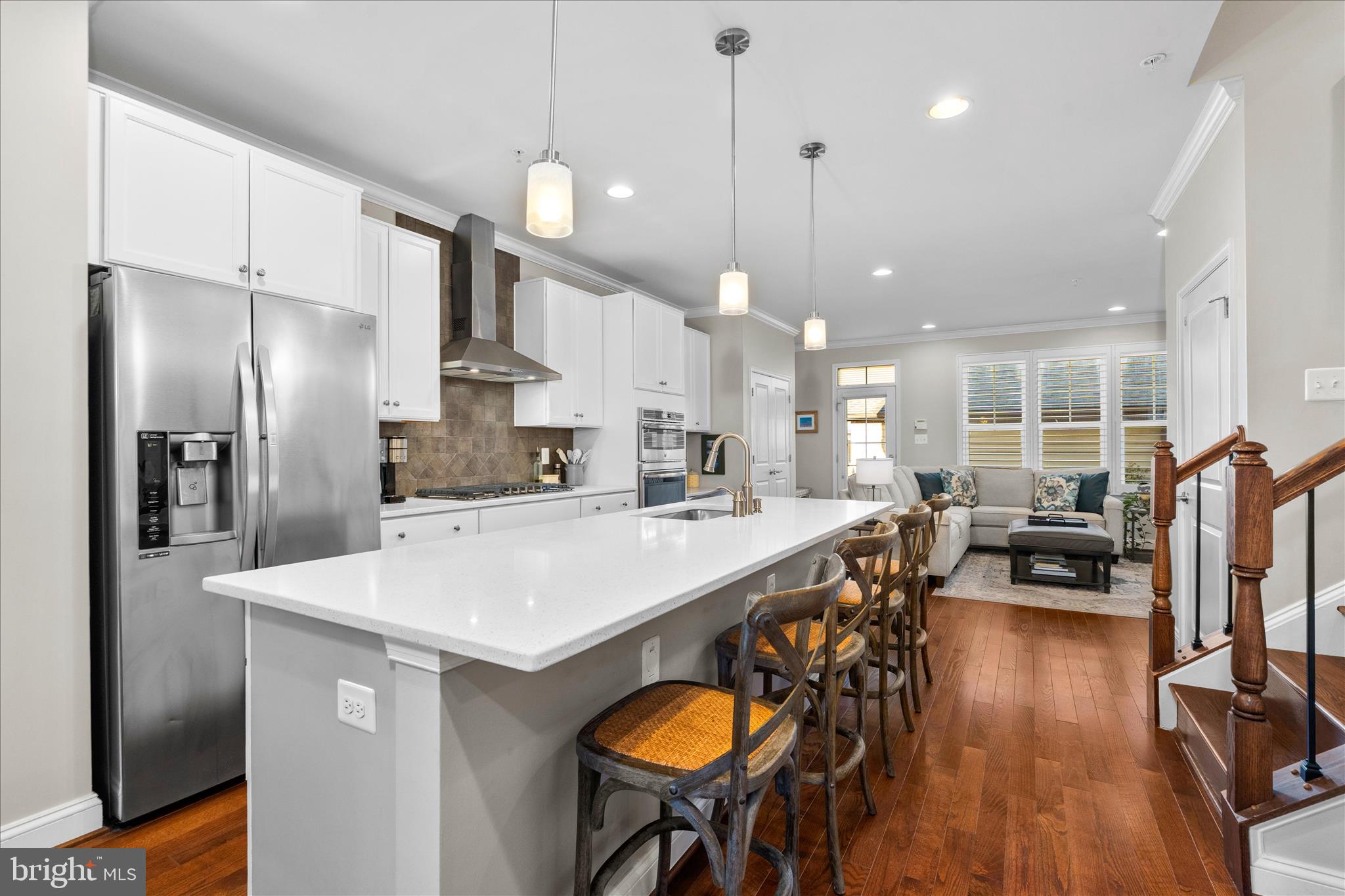 1135 Holden Road Frederick, MD 21701 - Photo 11 of 61 Kitchen island with pendent lighting