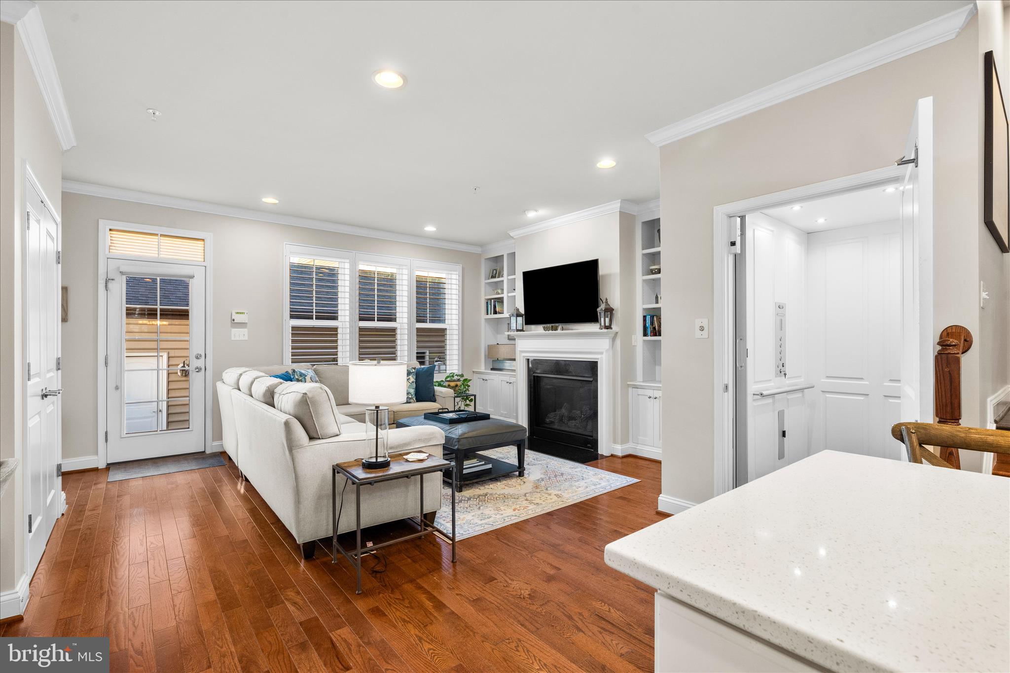 1135 Holden Road Frederick, MD 21701 - Photo 14 of 61 Main level living room with elevator access