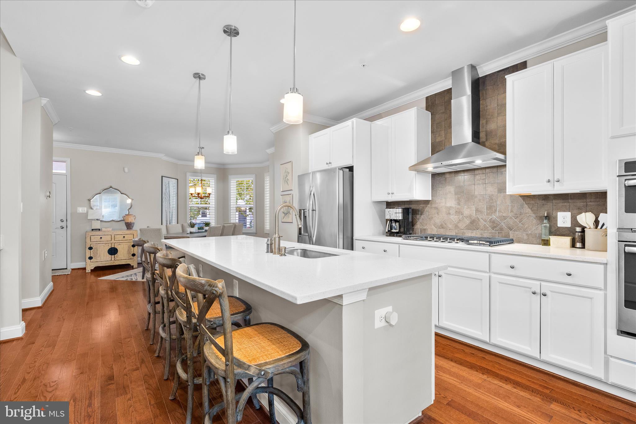 1135 Holden Road Frederick, MD 21701 - Photo 9 of 61 Kitchen island with bar seating
