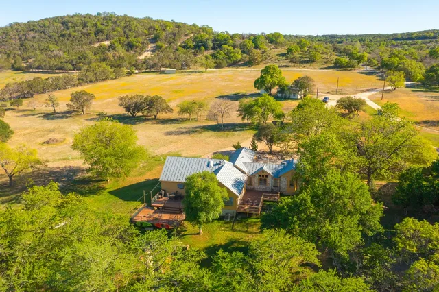 a view of an ocean with a mountain view