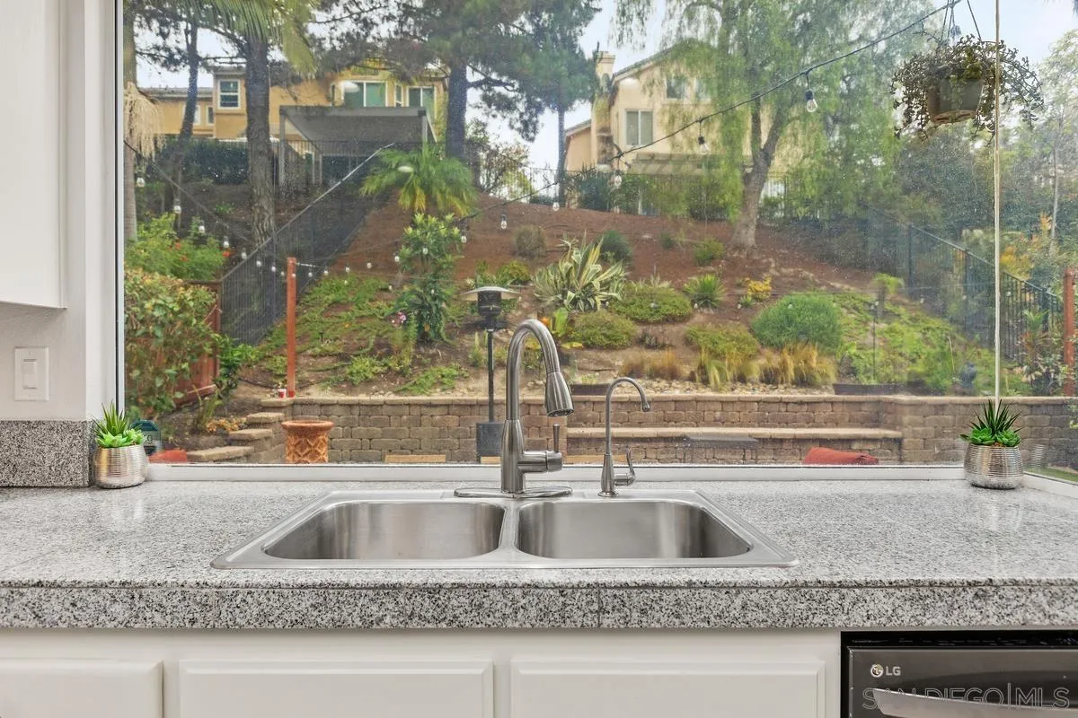 13847 Carmel Ridge Road San Diego, CA 92128 - Photo 14 of 40 a view of a sink and a window