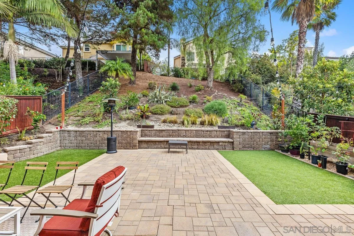 13847 Carmel Ridge Road San Diego, CA 92128 - Photo 35 of 40 a view of a chairs and table in backyard