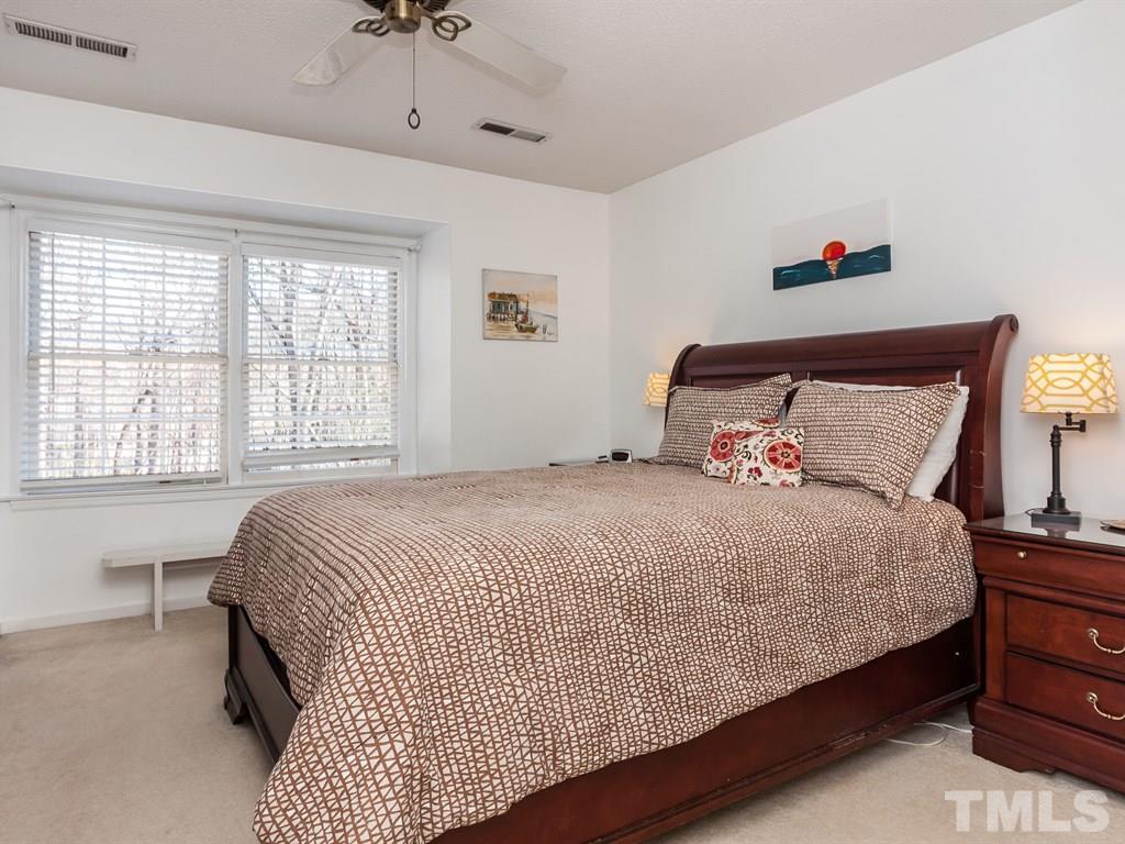 2866 Wycliff Road Raleigh, NC 27607 - Photo 14 of 25 a bedroom with bed and a window