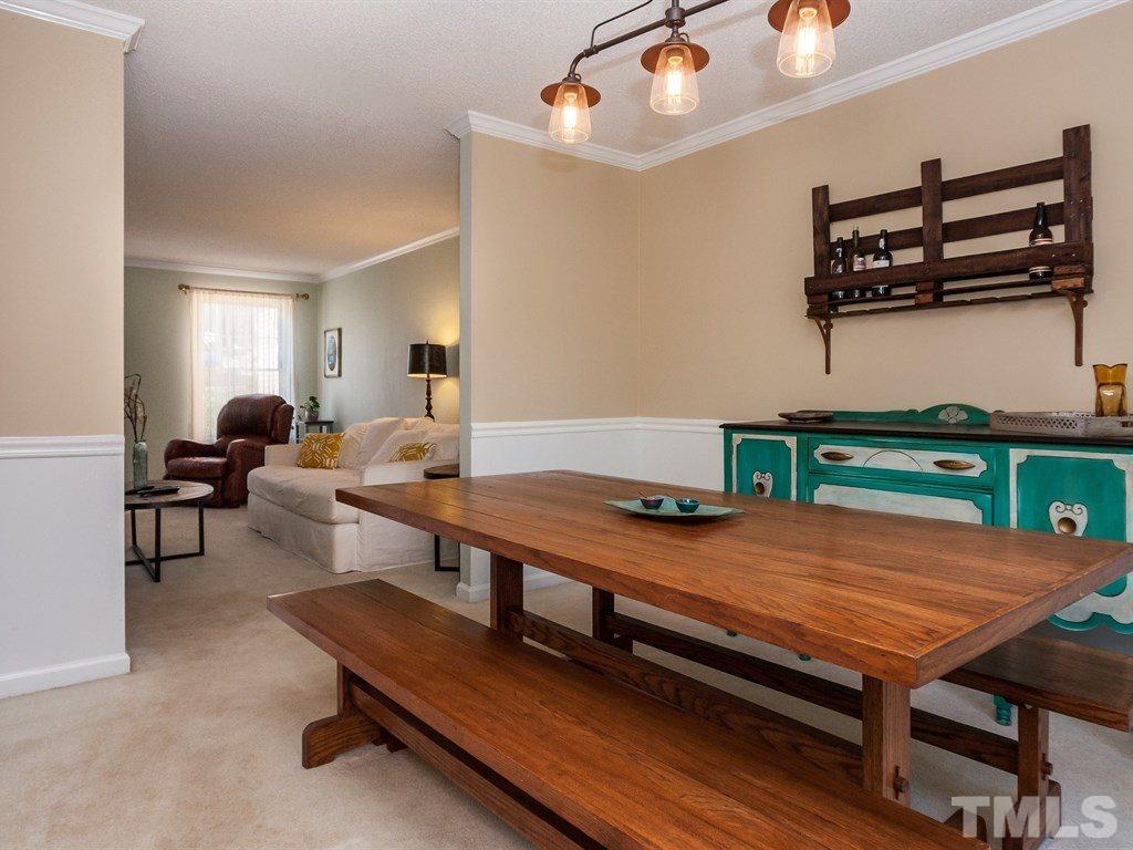 2866 Wycliff Road Raleigh, NC 27607 - Photo 8 of 25 a reading room with furniture and wooden floor