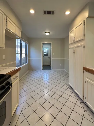 a bathroom with a shower and a toilet