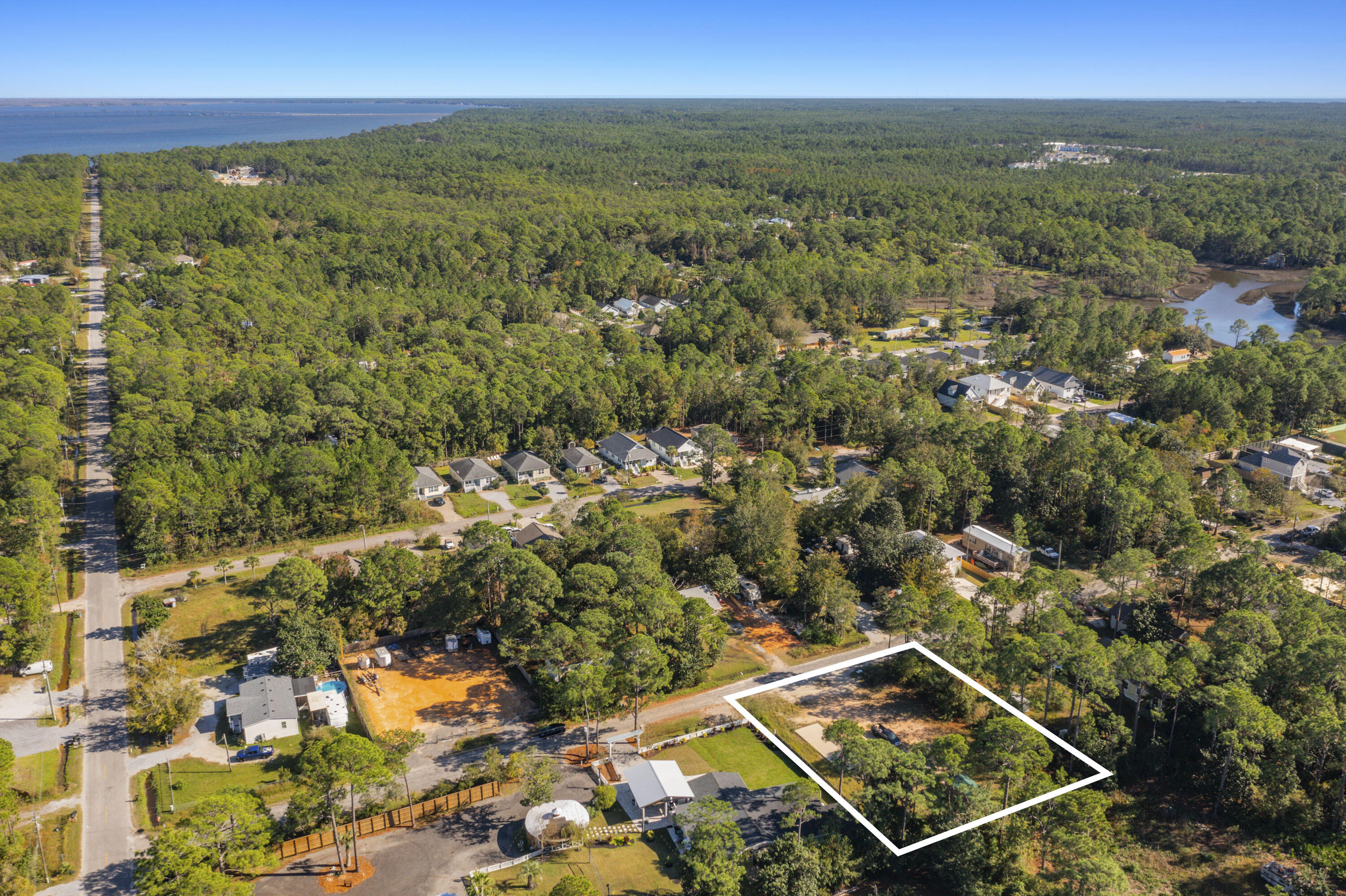 78 7th Street Santa Rosa Beach, FL 32459 - Photo 5 of 14 an aerial view of residential building with an outdoor space and seating