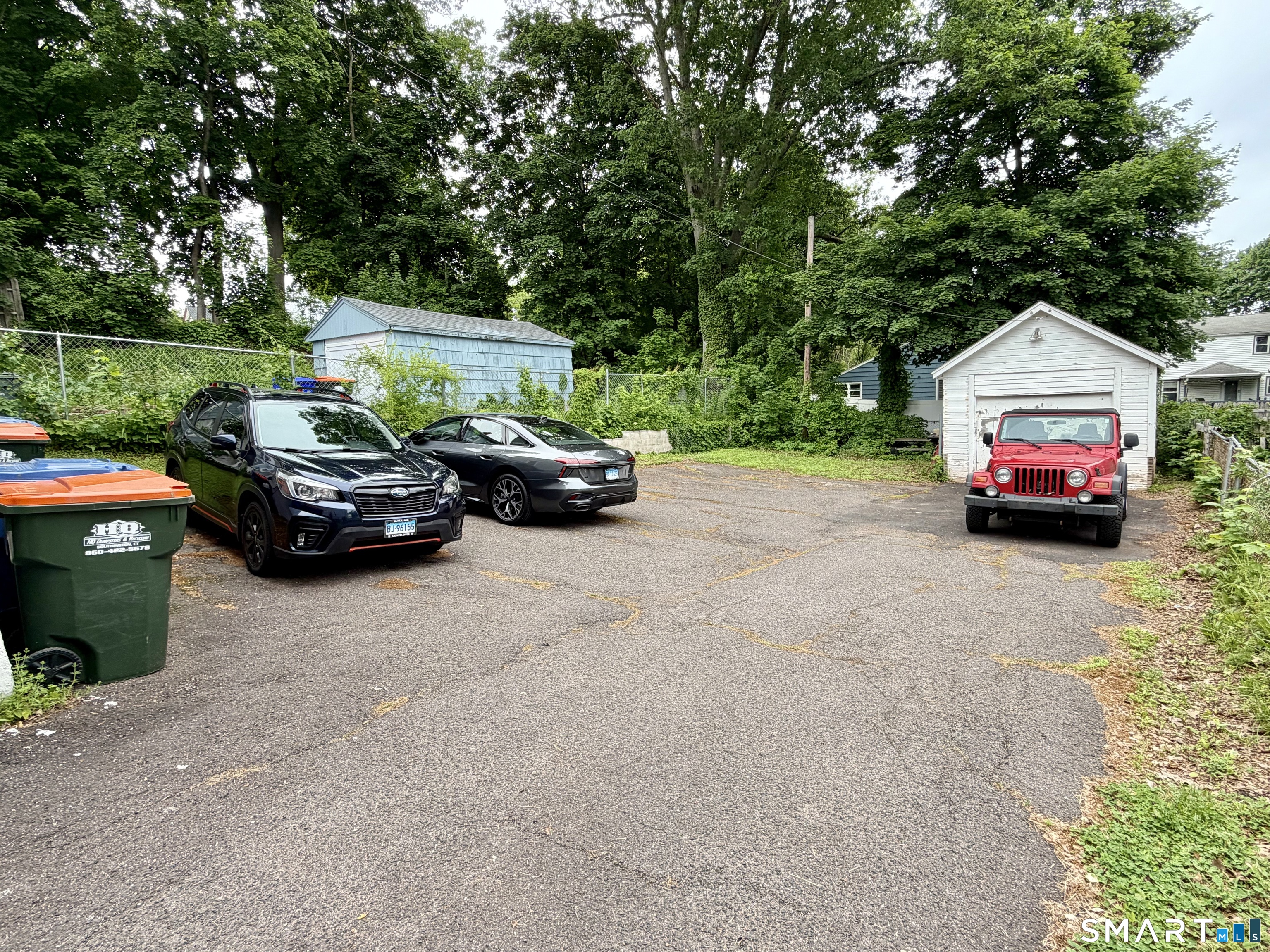 67 Pine Street Meriden, CT 06451 - Photo 31 of 34 a car parked on the side of the road