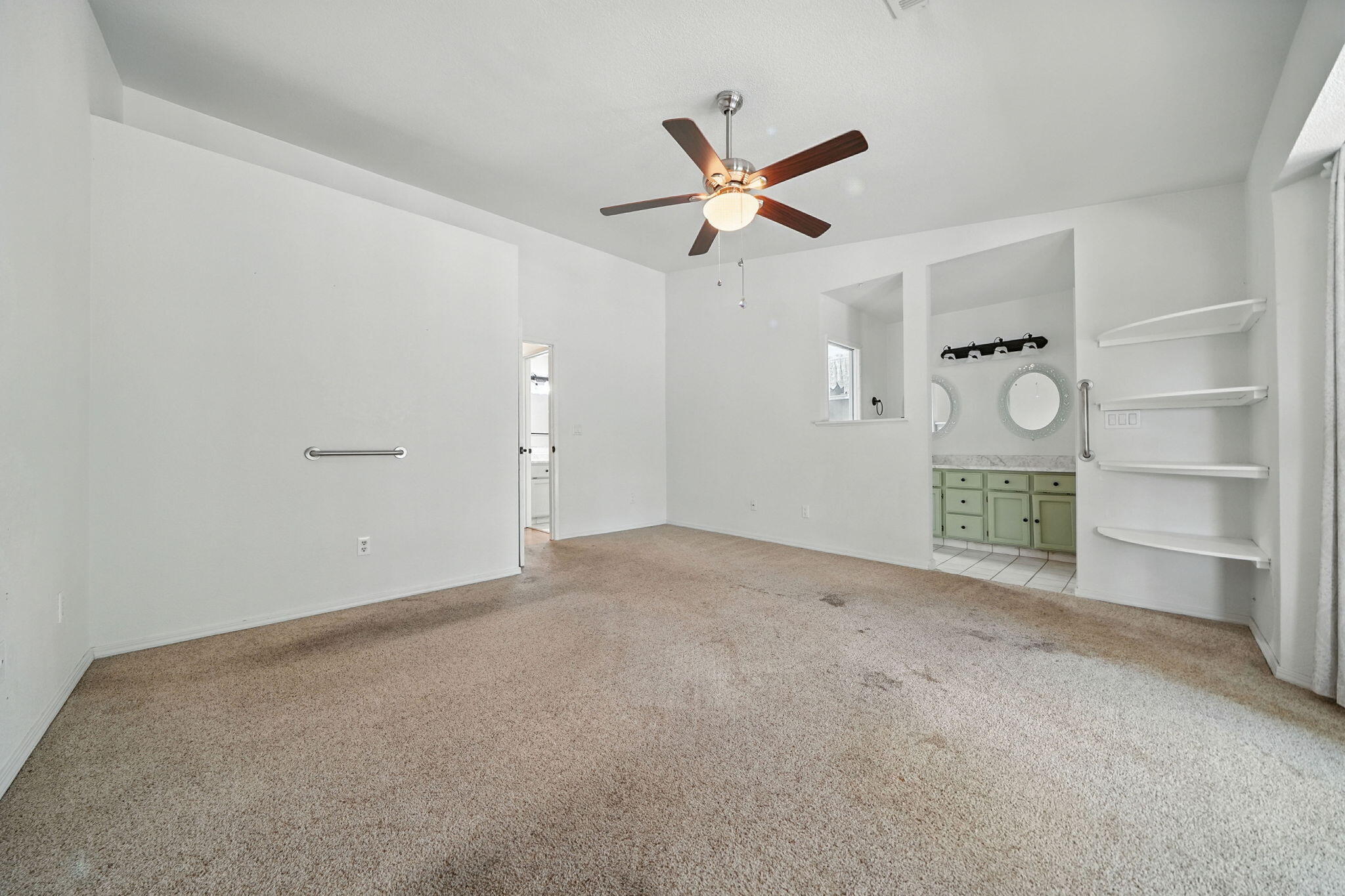 3588 Magnums Way Redding, CA 96003 - Photo 14 of 35 a view of an empty room and a bathroom