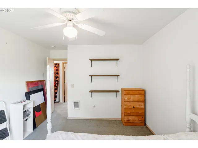 a view of livingroom with furniture and workspace