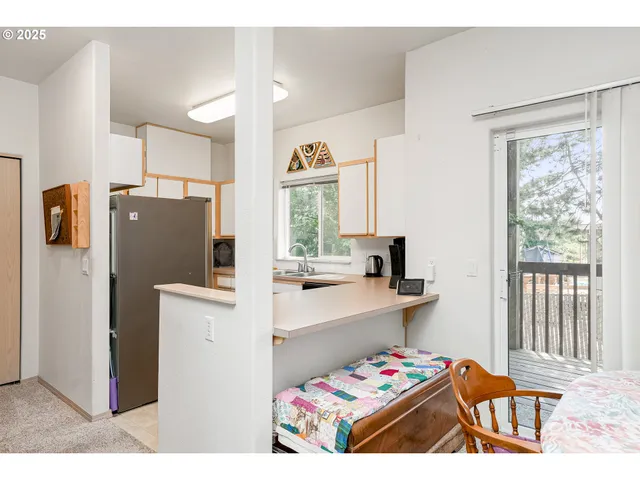 a bedroom with furniture and window