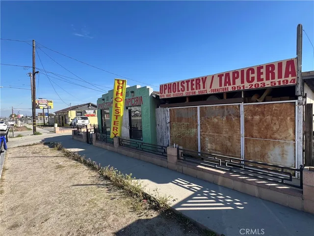 a view of a street with a building