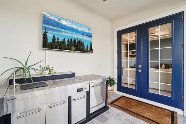 a bathroom with a sink vanity mirror and toilet