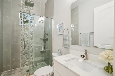 a view of a garage with rack and bicycle